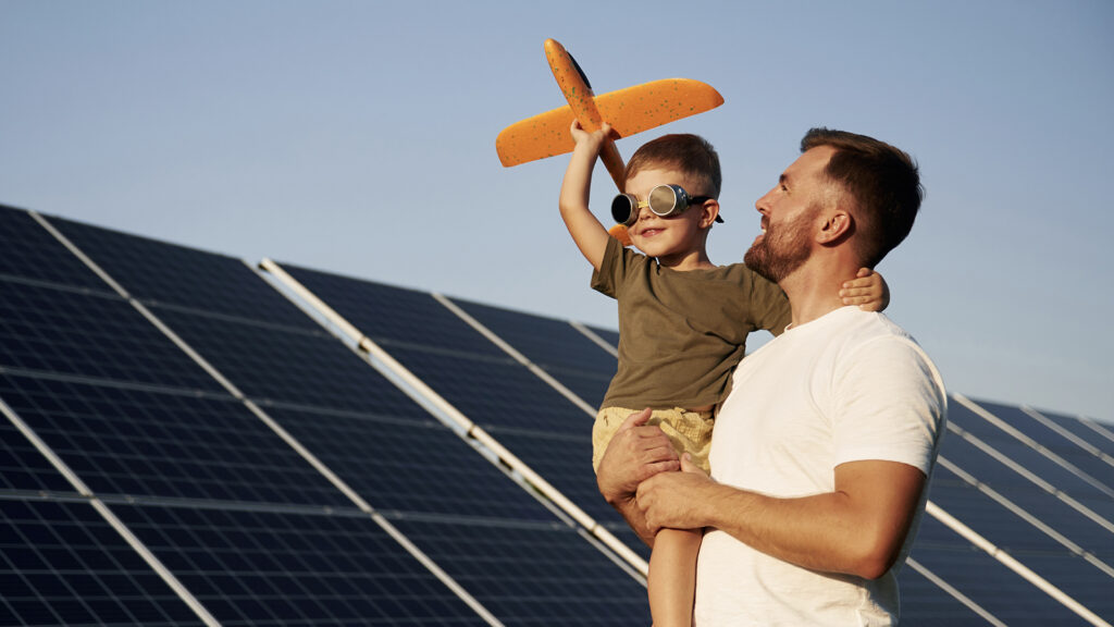 solar panels dad with son happy